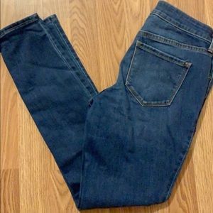 OLD NAVY, size 4 pop icon skinny jeans with rips.